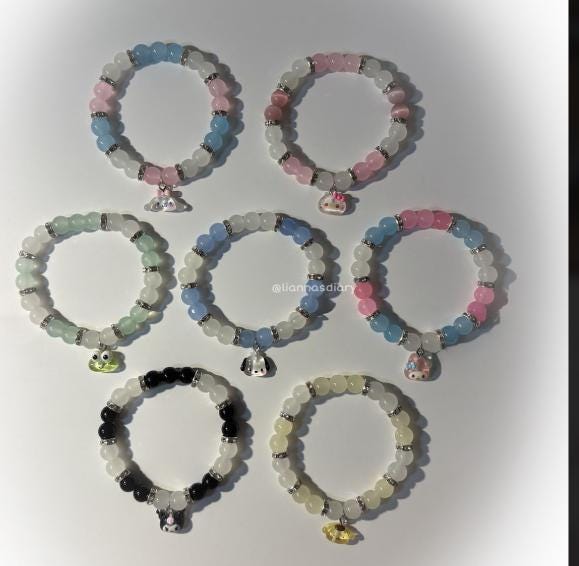 customized hello kitty bracelet:)buy 1 get 5 free rings