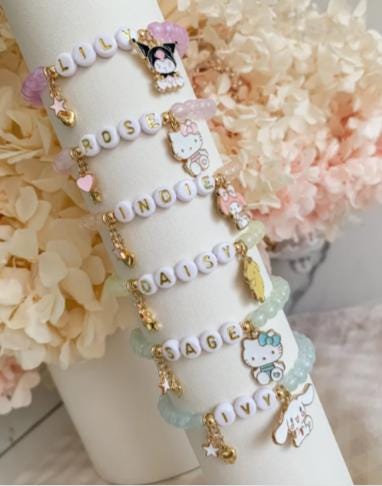 customized hello kitty bracelet:)buy 1 get 5 free rings